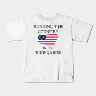 Running The Country Is Like Riding A Bike Kids T-Shirt